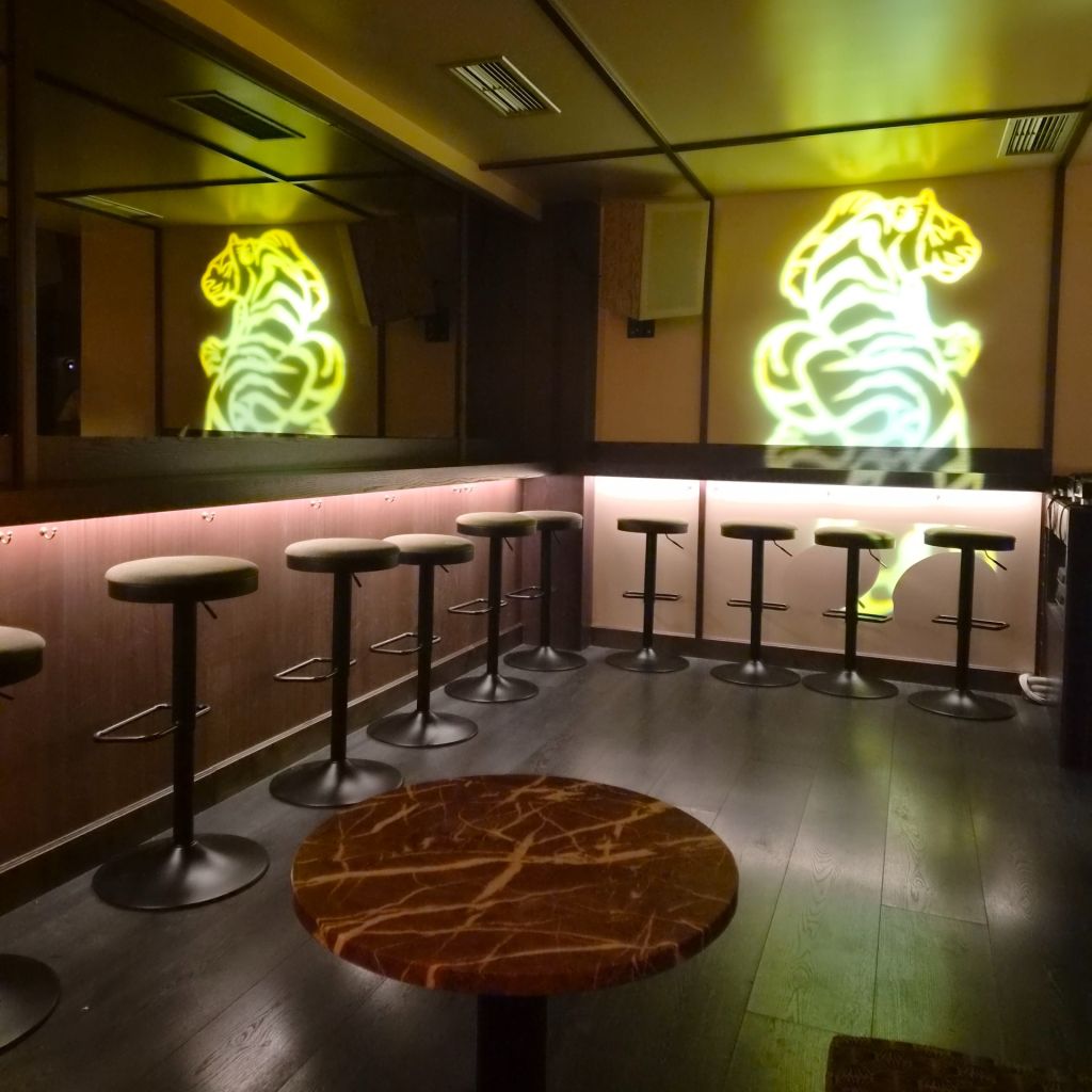THE BAR IN FRONT OF THE BAR